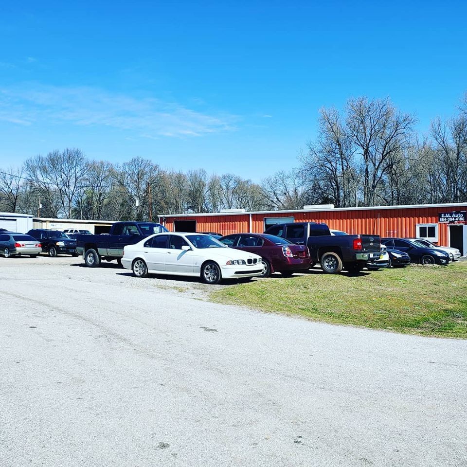 Our lot and the red building next door on Machine Dr